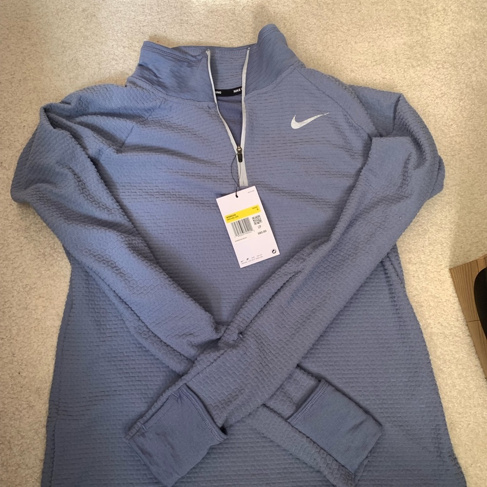 New Nike women’s half zip fleece running top